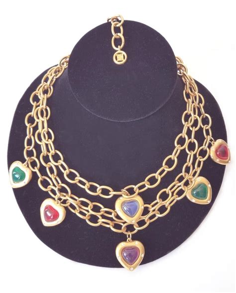 vintage givenchy heart necklace|Givenchy gold tone necklace.